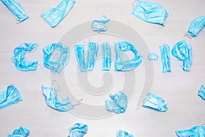 Used protective medical masks background COVID. Infectious waste, prevented virus covid-19 by separating infected waste