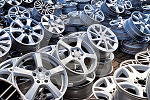 Used rims from cars in a row. Second hand - resale photo