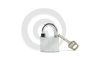 Used silver locked padlock with key Isolated on white