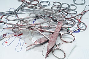 Used surgical instruments, placed on the table after surgery