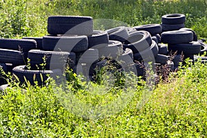 Used tires thrown in nature.