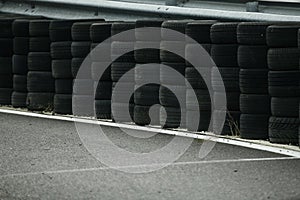 Used tyres used as guard rail on race circuit