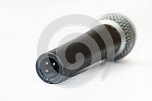 Used vocal microphone on the white background
