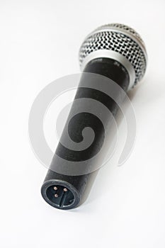 Used vocal microphone on the white background