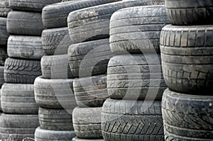 Used wheel tires stacked ready for recycling
