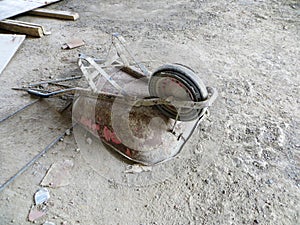 Used wheelbarrow at construccion site