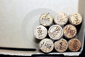 Used wine corks from various varieties of vintage red wine and vintage white wine depicting different dates and years of wine maki