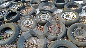 Used and worn out tyres piled up