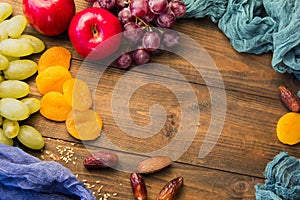 Useful fruit on the table grapes, apples