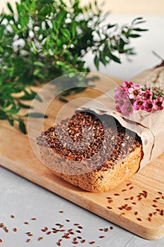 Useful home-made vegan sourdough bread from green buckwheat with flax and sunflower seeds. Raw healthy and proper nutrition