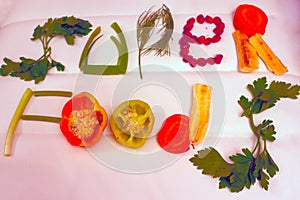 Useful products, vegetables and fruits are laid out in the inscription, healthy food