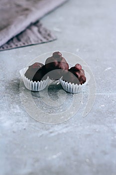 Useful raw chocolate sweets with cedar slicks photo