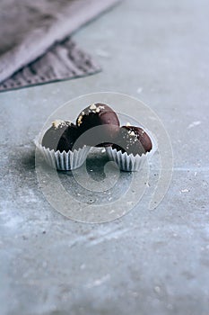 Useful raw chocolate sweets with cedar slicks photo