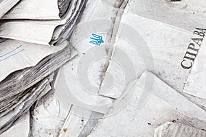 Useless paper documents on the landfill