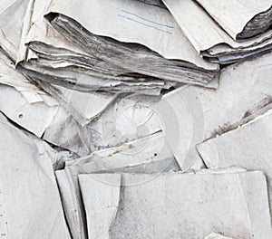 Useless paper documents on the landfill