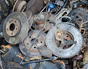 Useless, worn out rusty brake discs shock absorber and other