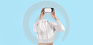 Exploring virtual reality with a modern headset in a minimalist setting photo
