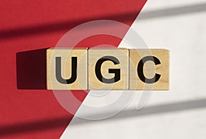 User generated content, UGC acronym on wood cubes