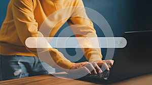 User working with a laptop computer on the table. Search engine optimization of the internet with the search bar.
