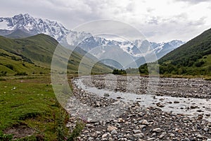 Ushguli- Patara Enguri River flowing down the valley in the Greater Caucasus Mountain Range in Georgia.