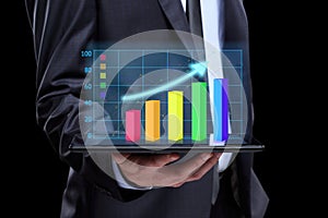 Usinessmen, hand touch screen graph on a tablet