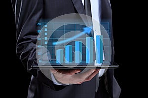 Usinessmen, hand touch screen graph on a tablet