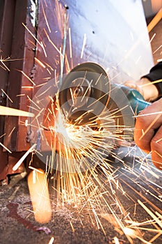 using angle grinder to cut metal