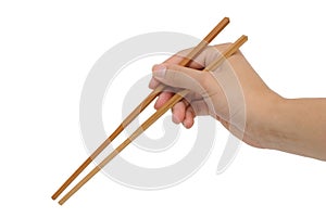 Using bamboo chopsticks with hand