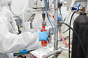 Using Bottle Capping Machine photo