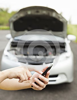 Using cell phone to dial service number , a broken car