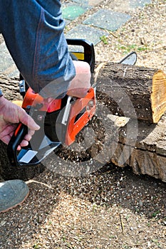 Using a chainsaw