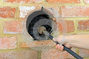 Using A Chimney Sweep Brush