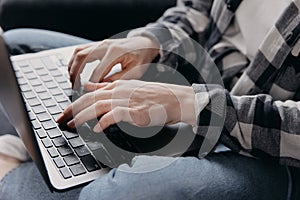 using computer, hand typing message on keyboard laptop