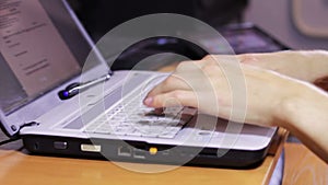 Using Computer Laptop on Wooden Desk