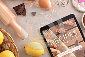 Using digital cookbook app in tablet in pastry