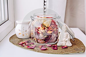 Using dry rose petals to make rose potpourri which is great for home scent.