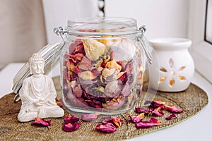 Using dry rose petals to make rose potpourri which is great for home scent.