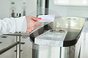 Using electronic card key for access through turnstile