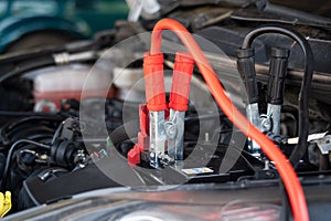 Using jumper cables to start-up a car engine,Low battery