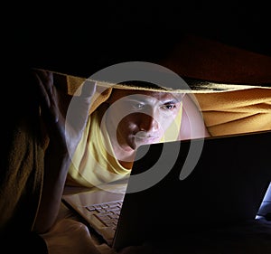 Using laptop in the blanket