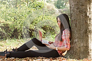 Using laptop-student learns outdoors