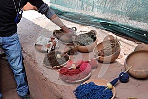 Using natural dyes for wool in Cuzco, Peru