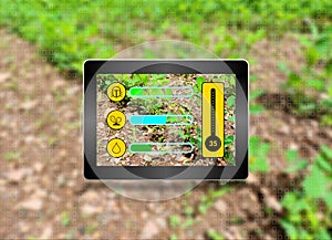 Using samrt tablet for farming concept. .new generation apps showing all about farm