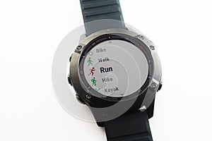 Using smart watch in run activities. Fitness tracker screen. Healty lifestyle and medicine