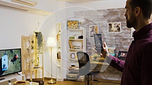 Using a voice activated application to turn on the light bulbs in the house