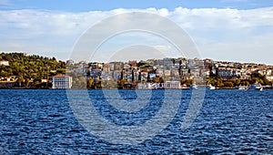 Uskudar cityscape and sea traffic on the bosphorus photo