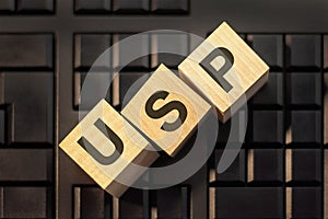 USP - Unique Selling Proposition - letters on wooden blocks