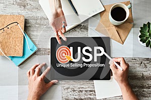 USP - Unique selling propositions. Business and finance concept on device screen.