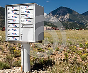 USPS metal mailboxes for rural homes with I voted stickers for vote by mail