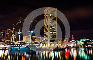 The USS Constellation and World Trade Center at night, in the In